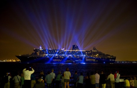 Cunard's flagship Queen Mary 2 departs from New York with a theatrical light and music show after completing her 175th Anniversary tour, Tuesday, July 14, 2015.  This month marks the 175th Anniversary of Cunard, and Queen Mary 2 has recreated the historic Transatlantic Crossing from Liverpool to Halifax and Boston made by the RMS Britannia in July 1840.   Although not a port of call in the original crossing made by Britannia, New York has been Cunard's North American home port for over a century.  (Photo by Diane Bondareff/AP Images for Cunard)