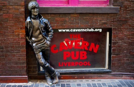 LIVERPOOL, UK - APRIL 18TH 2014: A statue of John Lennon opposite the historic Cavern Club in Liverpool's Mathew Street on 18th April 2014.